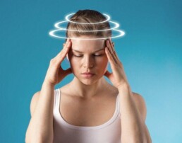 Woman with vertigo. Young patient suffering from dizziness