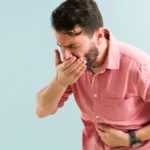 Back Pain and Nausea: Causes, Symptoms, and When to Worry