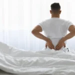 Waking Up With Lower Back Pain: Causes, Sleeping Positions, and Relief