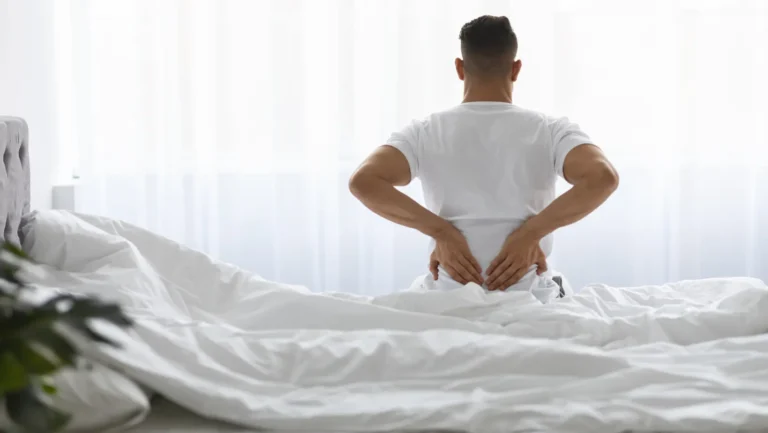 Waking Up With Lower Back Pain: Causes, Sleeping Positions, and Relief